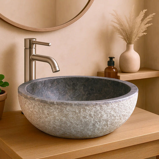 Découvrez notre vasque en marbre noir naturel, finition mate. Idéale pour une salle de bain sobre et moderne. Pièce unique, robuste et facile à entretenir.